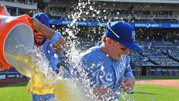 Aug 22, 2022; Kansas City, Missouri, USA; Kansas City Royals right fielder Drew Waters (6) gets an ice water shower after defeating the Chicago White Sox at Kauffman Stadium. Mandatory Credit: Peter Aiken-USA TODAY Sports